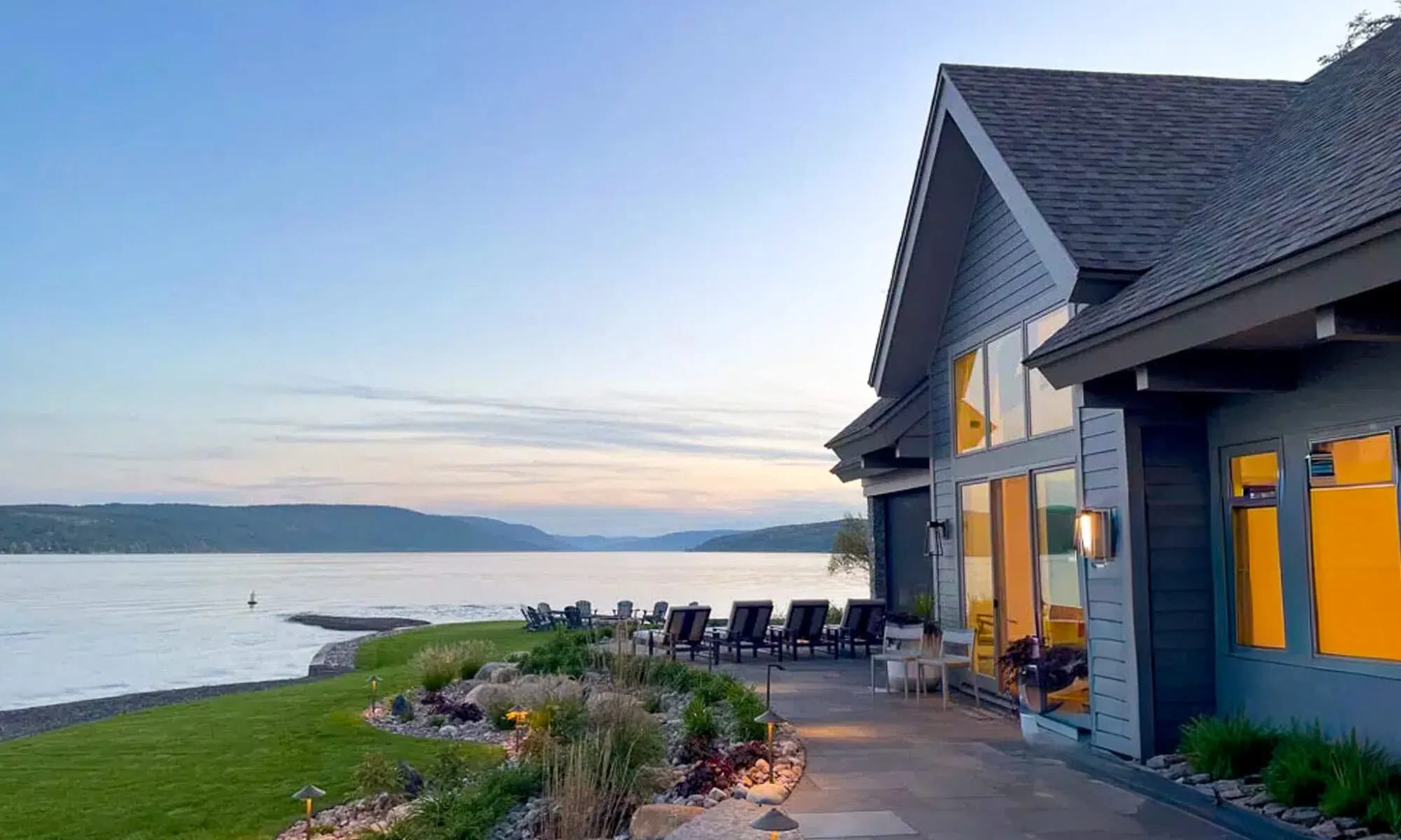 Lakeside home and landscaped shoreline on Canandaigua Lake designed by Costich Engineering for the Menteth Drive residential redevelopment.