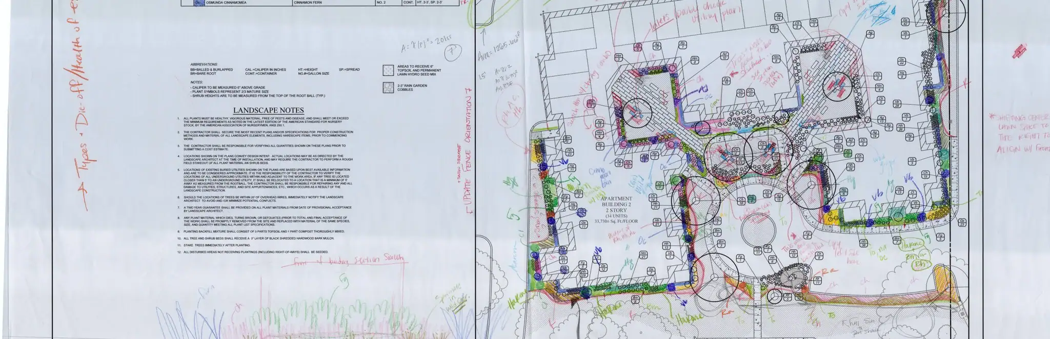 Annotated landscape plan showing detailed plant schedule, line legend, and design markups for a multi-building residential site, including hand-written field notes and landscape layout revisions.